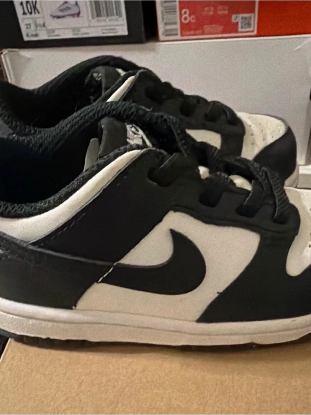 Nike Kids Black and White Low-Top Sneakers with Swoosh